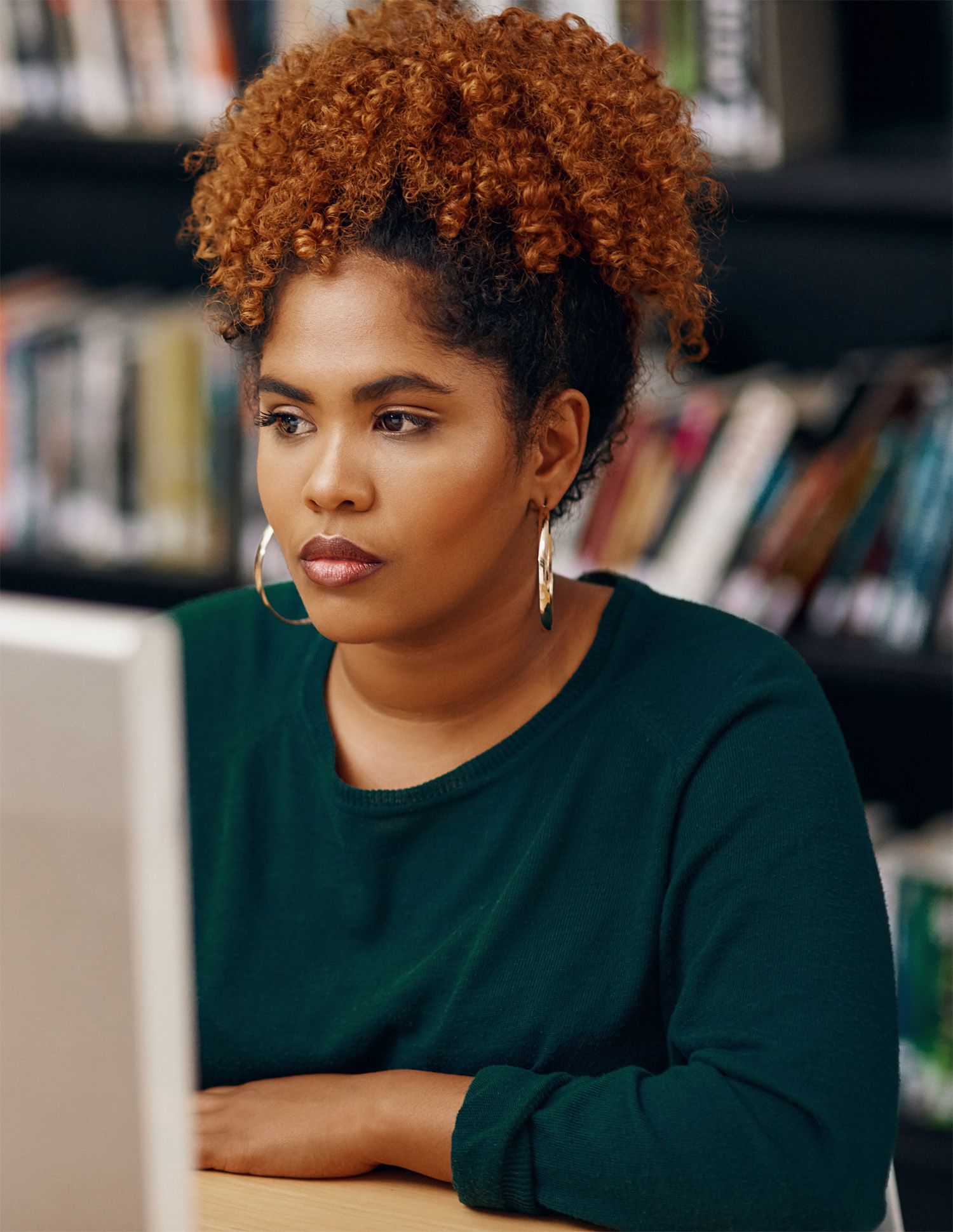 High angle shot of a young woman working